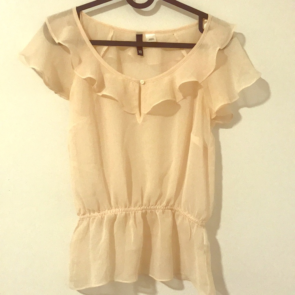 Cream colored sheer flouncy top